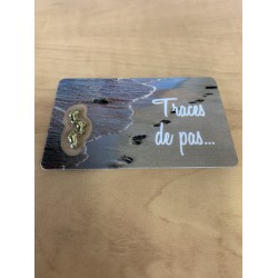Carte avec médaille trace de pas